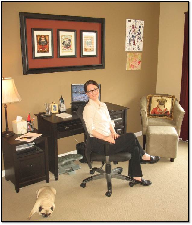 Arden Zich in home office with Peanut pug